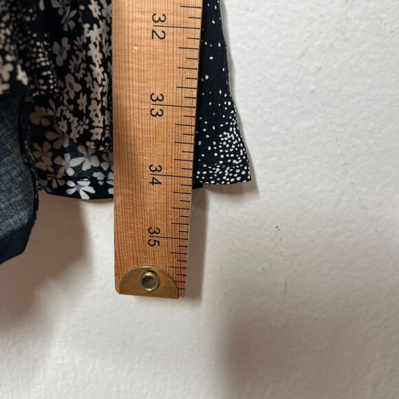 Olivaceous Black and White Floral Halter Tie Neck Open Back Flowy Romper Medium - Picture 10 of 11